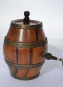 A vintage 20th century plum line in the form of a Coopered barrel having tap to front with winder to
