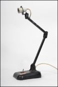 A vintage industrial table top anglepoise desk lamp having a pendant shade with adjustable arm