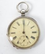 A silver early 20th century pocket watch by John Walker, Strand, London. Open faced with key wind,