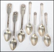 A group of seven silver hallmarked teaspoons, two partial sets with assay marks for Sheffield and