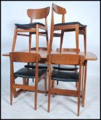 A 1970's retro Portwood furniture teak dining table and 6 chairs of Danish influence. The table