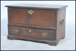 An 18th century mahogany small proportion coffer / silver mule chest raised on bracket plinth base