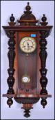 A 19th century walnut cased vienna regulator wall