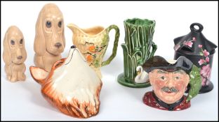 A collection of ceramics from the 20th century to include a wall mask in the form of a fox, Sylvac