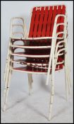 An excellent set of 4 1970's retro tubular painted metal and red plastic slatted cafe - garden