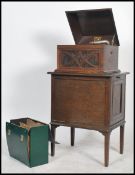 An early 20th century HMV / His Masters Voice table top oak cased gramophone, lift up hinged lid