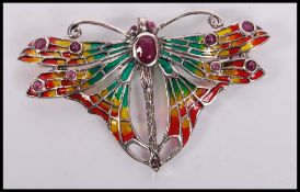 A sterling silver a plique a jour dragon fly brooch with pin to verso, weighs 9.2 grams.
