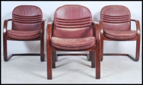 A set of four 1970's Danish inspired red leather c