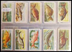 Tea Cards: An album of assorted vintage tea trading cards, all complete sets. From a large private