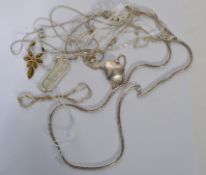 A collection of 8 sterling silver bracelet and necklace chains and pendants to include amber