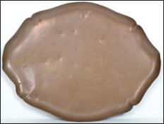 An early 20th century Joseph Sankey and Sons Art Nouveau copper tray of scalloped form with