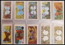 Tea Cards: An album of assorted vintage tea trading cards, all complete sets. From a large private