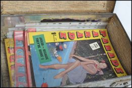 A collection of vintage gentleman's Parade glamour magazines dating from the 1960's most in