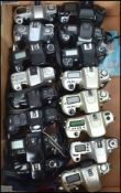 A collection of 20th century camera's to  include  sixteen Canon, Nikon and Minolta SLR film cameras