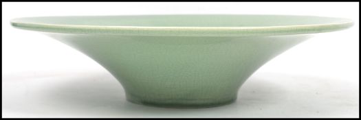 A Chinese /  Oriental ceramic celadon crackle glaze bowl of large tapering form. Measurements: 9