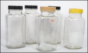 A collection of 5 retro 20th century large glass sweet jars dating from the 20th century, all with