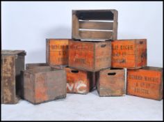 A collection of ten vintage retro beer / ale transportation / advertising stacking cases, each