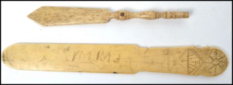 A Georgian 19th century ivory carved page turner having an inscribed date 1826 having chase