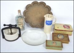 A collection of curios to include a Tongue / Cheese press, a Horlicks Mixer, a large early 20th