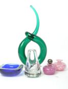 A group of vintage 20th century studio art glass to include an unusual sculpture raised on a