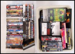 A large collection of assorted DVD's (x2 crates). Many 'cult' related, and some music interest. To