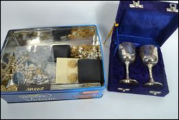 A collection of vintage and modern costume jewellery to include Nakar pearl necklace, earrings,