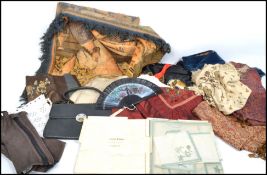 A large quantity of vintage textiles to include large wall hanging, Japanese embroidered dressing