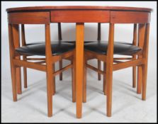 A good Danish manner retro 20th century teak wood dining room suite - table and chairs in the manner
