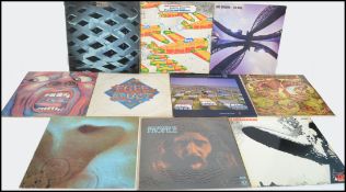 A collection of vinyl long play LP records to include Rod Stewart / Faces, The Who, Pink Floyd,