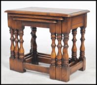 A good ipswich oak peg jointed nest of tables. The turned legs united by stretchers, of heavy set