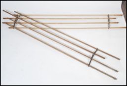 A pair of Victorian 19th century slatted laundry pulley rails / towel rails. Each with cast iron