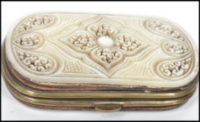 A good early 20th century ladies mother of pearl adorned penny purse having fret pierced mother of