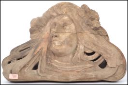 A stunning 19th century Art Nouveau carved wooden bust of a female form, carved from a singular