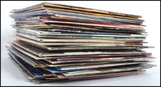 A collection of vinyl long play LP records by various artists to include Squeeze, Peter Straker,