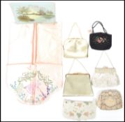 A collection of vintage 20th century ladies evening clutch bags / purses to include beaded