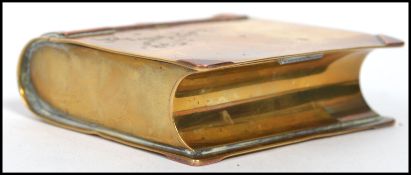 An early 20th century World War One WW1 trench art tobacco box of copper and brass construction in