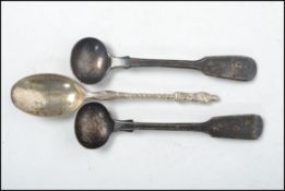 A collection of 2  silver hallmarked table condiment ladels by Robert Williams of Exeter, date