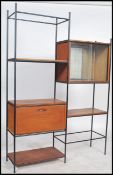 A good mid century Danish inspired teak wood and ebonised metal upright modular wall system in the