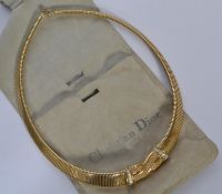 A 20th century Christian Dior Bijoux goldtone necklace set with rhinestones Marked to foldover