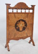 A 19th century Victorian Arts and Crafts wooden firescreen inlaid with specimen woods and decorative