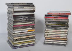 A collection of 1980's rock CD's from several artists to include Magellan, Entombed, Napalm Death,