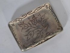 A silver hallmarked part vinaigrette with chased floral decoration and gilt opening pierced panel.
