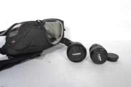 A cannon EF-s 17-85mm Ultra sonic Macro camera lens together with a Tamron SP 17-50mm F / 2.8 camera