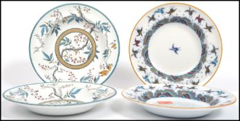 A group of four 19th century Victorian Aesthetic movement Minton ceramic bowls including a pair of