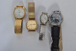 A collection of watches to include a nice Bernex automatic with white dial and date aperture