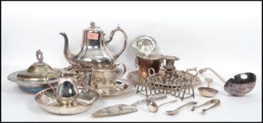 A collection of 19th and 20th century silver plated items to include a pair of stunning toast