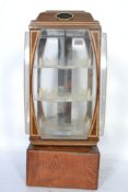 A retro 20th century shop advertising point of sale illuminated revolving octagonal display cabinet,