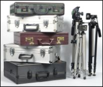 A group of five photography camera flight suitcases, of briefcase form, camo, silver etc all with