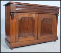 A Victorian style flame mahogany chiffonier sidebo