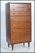 A 1960's Ernest Gomme ( early G-Plan ) tola teak wood seminaire upright pedestal chest of drawers.